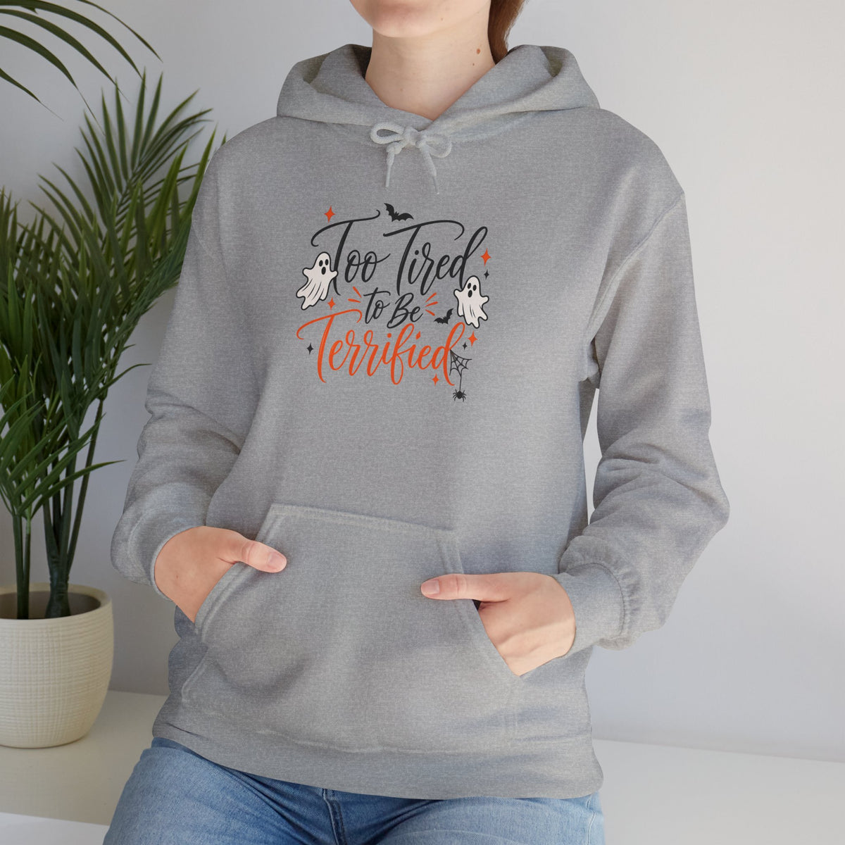 Hoodie — "Too Tired to Be Terrified" Cozy Halloween Graphic Hoodie