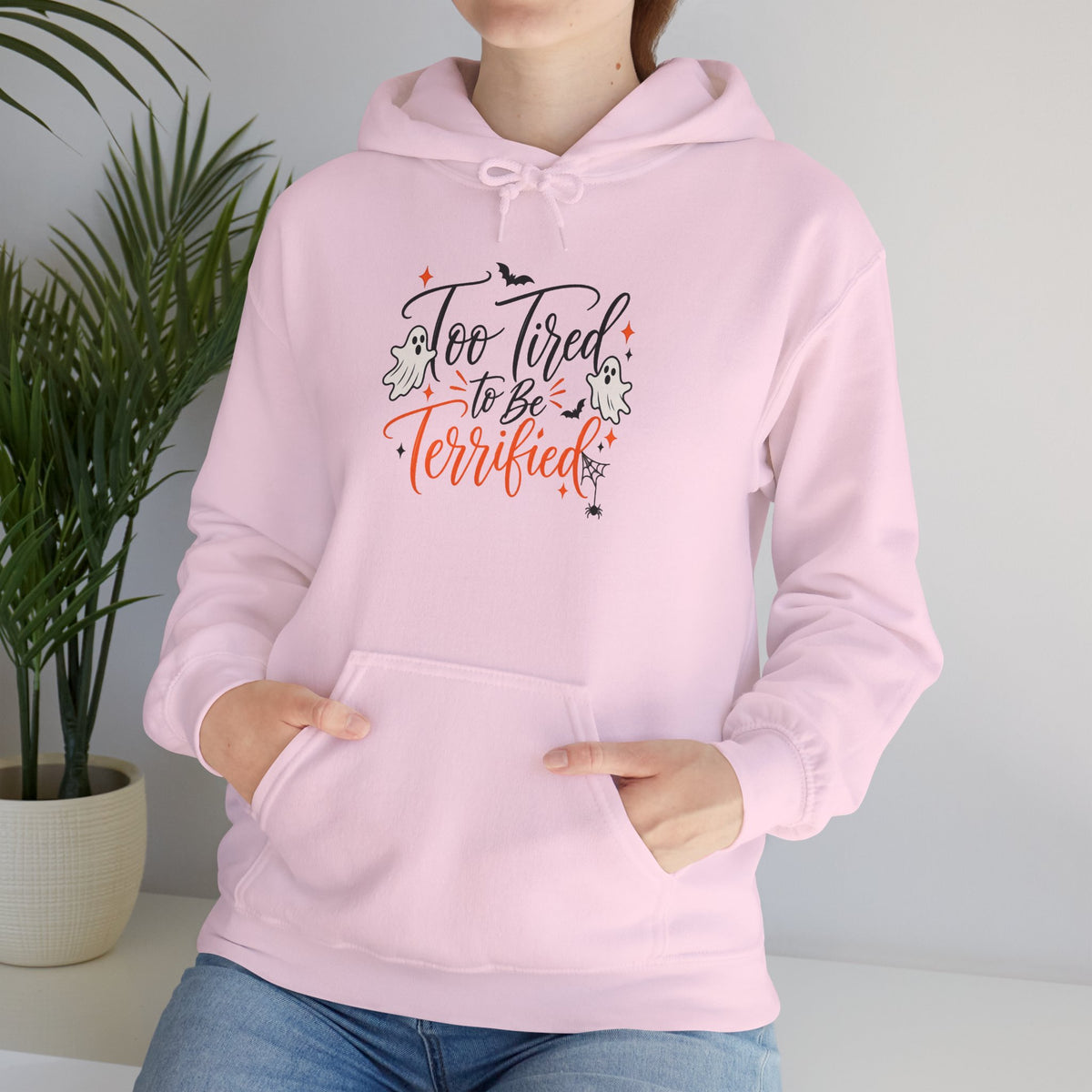 Hoodie — "Too Tired to Be Terrified" Cozy Halloween Graphic Hoodie
